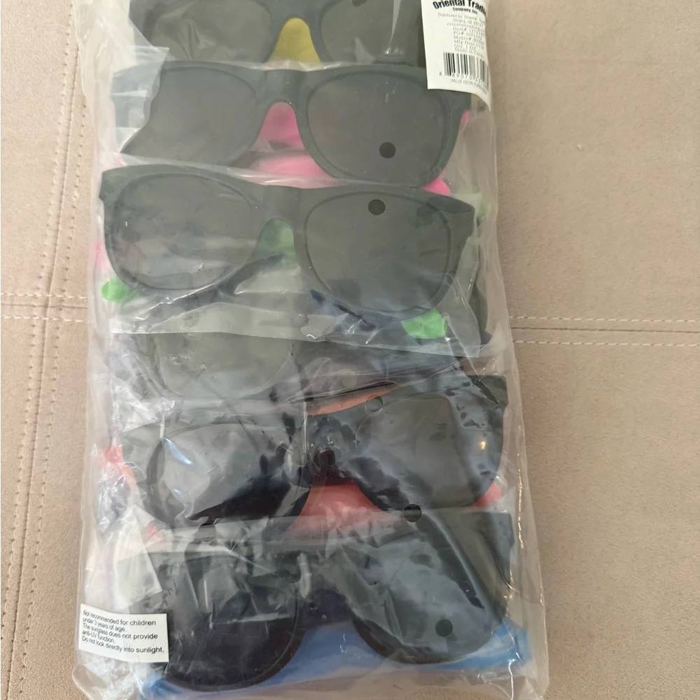 Twelve Plastic Sunglasses